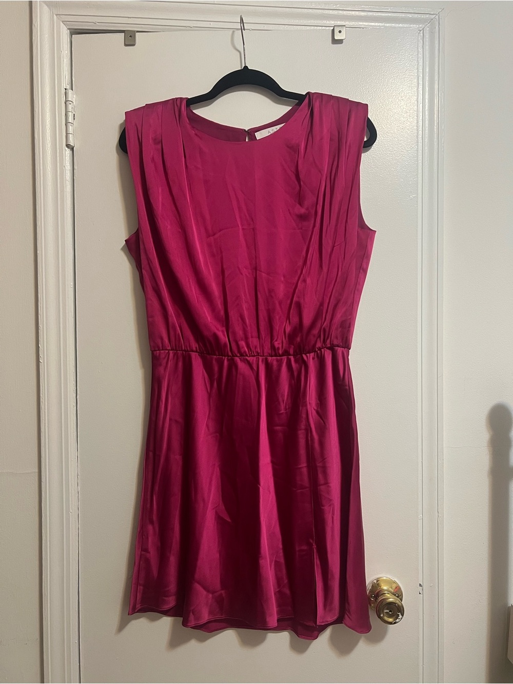 Magenta mini satin dress with shoulder pads.